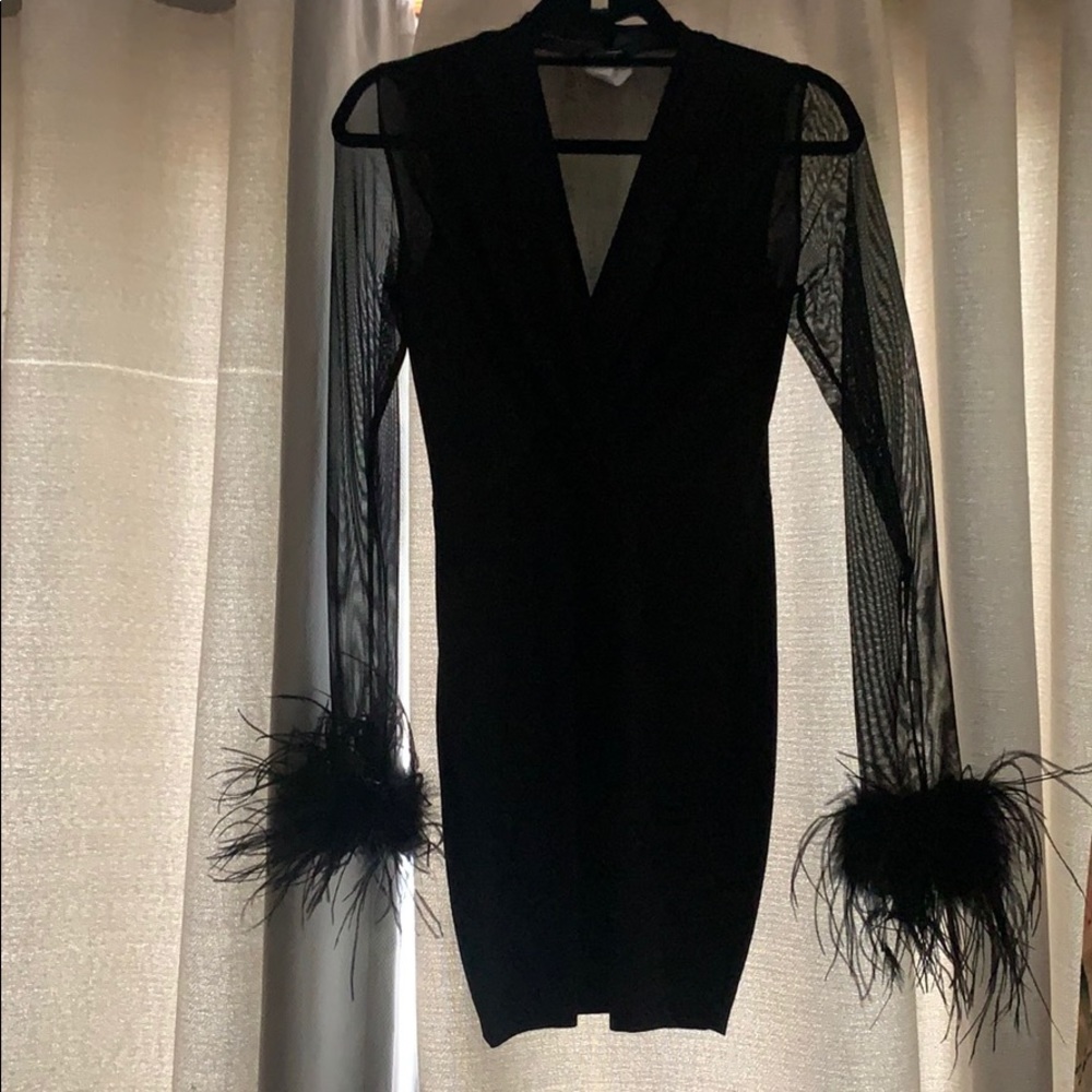 Sexy black dress with fur cuffs